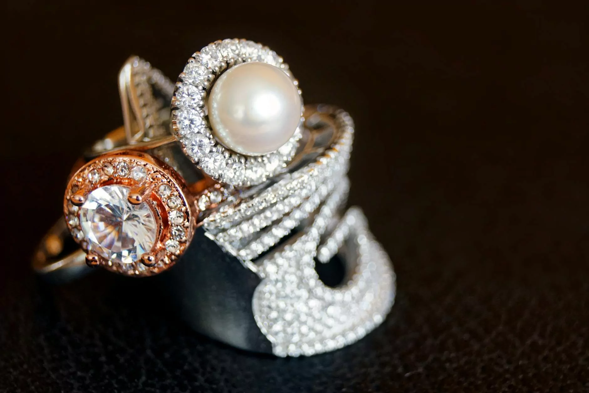 Close view of decorative rings showing rounded and openwork forms